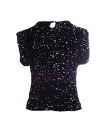 Bluza neagră cu paiete, vedere din spate, guler elegant.