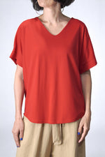 Bluză roșie cu croială lejeră și mâneci scurte cu manșetă