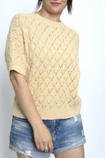 Bluză tricotată bej din bumbac cu mâneci scurte și model ajurat