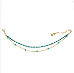 Brățară de gleznă cu două fire – mărgele turcoaz și lanț subțire auriu, cu închidere reglabilă și charm rotund