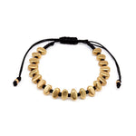 Brățară boemă cu ovale aurii și șnur negru reglabil, pe fundal alb
