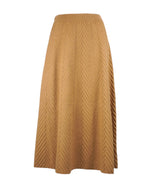 Imagine frontală a unei fuste din tricot gros, cu model reliefat și talie elastică, lungă.
