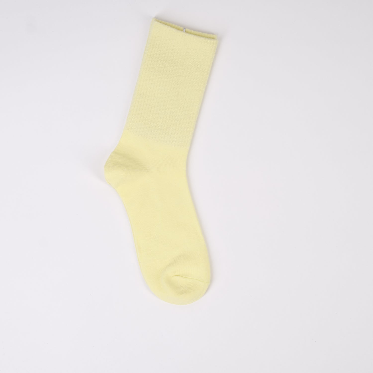 Șosetă galben pal, cu textură fină și elastic pe gambă