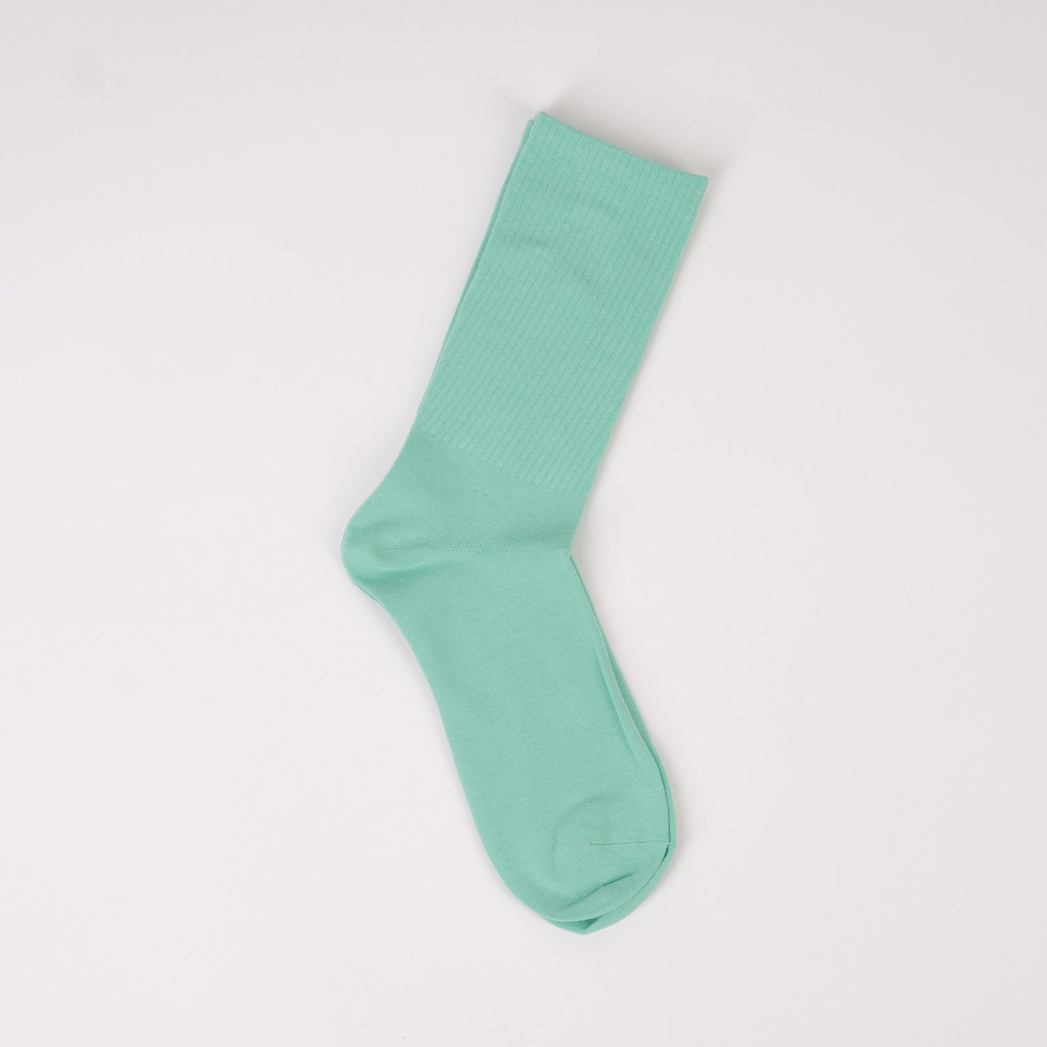 Șosetă în nuanță turcoaz cu elastic lejer și design reiat în partea de sus