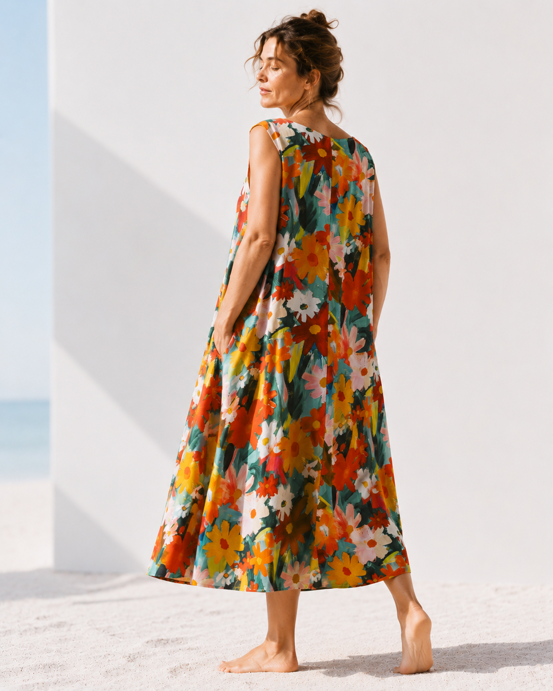 Detaliu imprimeu cu margarete colorate pe rochia din bumbac — All Above Boutique.