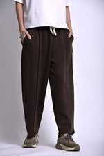 Pantaloni conici cu talie elastică, nuanță negru, vedere din față