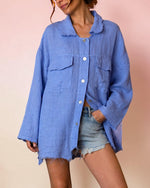Camasa oversize din in albastru cer senin cu nasturi sidef si tiv destramat, vedere frontala, All Above Boutique