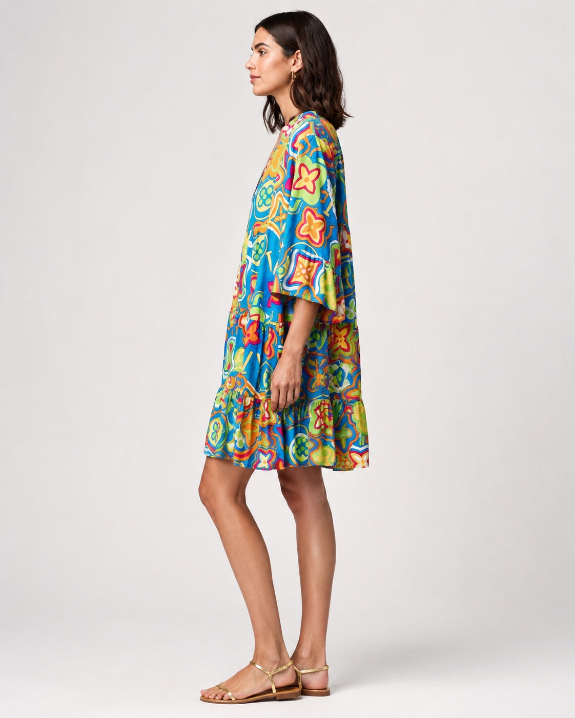 Rochie A line cu mânecă 3/4 și print cu flori colorate, vedere din profil.