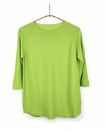 Bluza verde lime cu mâneci 3/4, design lejer, perfectă pentru ținute casual.