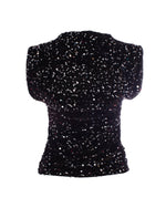 Bluza neagră cu paiete, vedere din față, detaliu strălucitor.