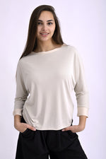 Bluză ivoar din viscoză și poliester, cu croială dreaptă și mâneci trei sferturi, vedere frontală.