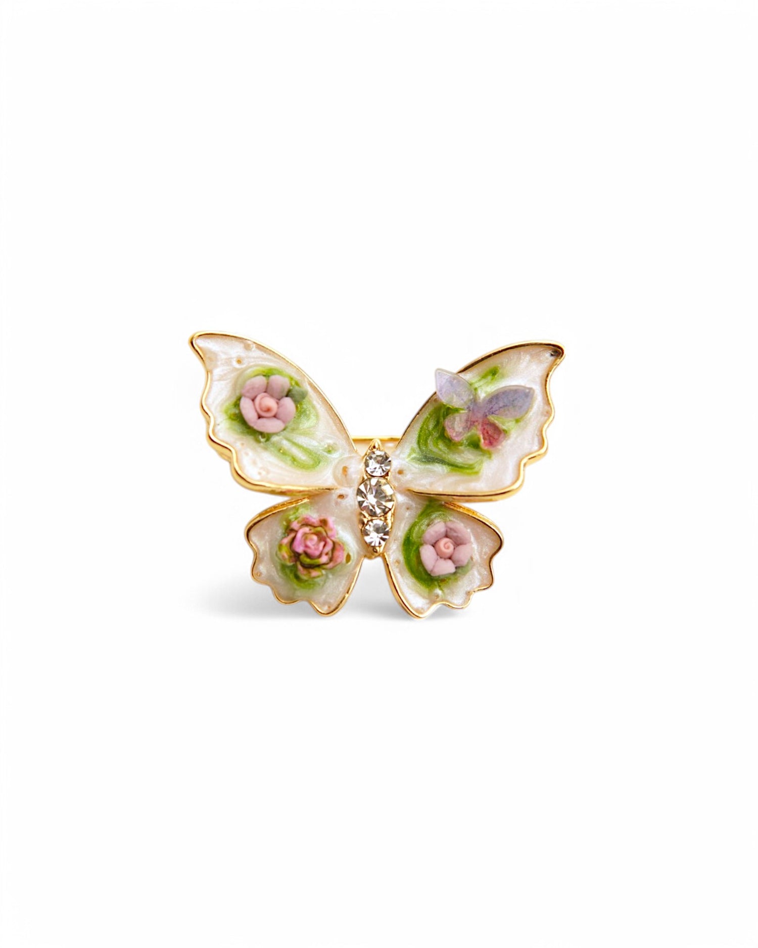 Broșă fluture auriu cu detalii florale delicate, realizată în stil porțelan.
