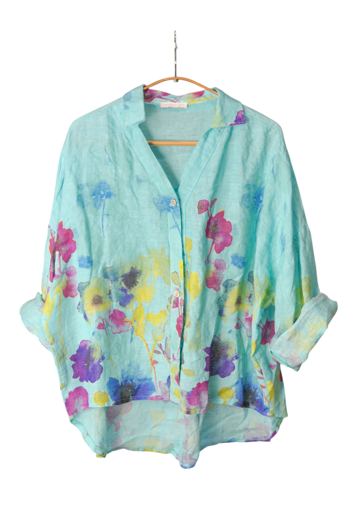 Cămașă turcoaz din in cu imprimeu floral multicolor, mâneci lungi rulate și croială lejeră asimetrică