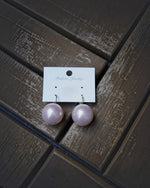 All Above Boutique large pearl statement earrings with stainless steel closure, ideal for elegant and casual looks.