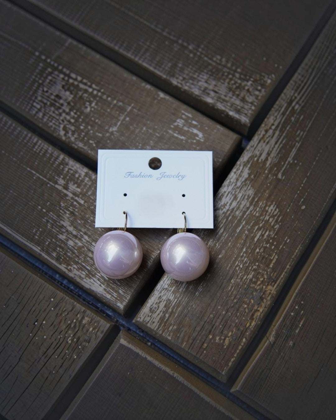 All Above Boutique large pearl statement earrings with stainless steel closure, ideal for elegant and casual looks.