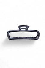 Clește de păr metalic negru, rezistent, ideal pentru fixarea părului gros sau lung.