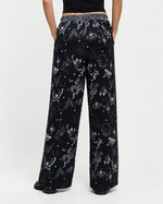 Pantaloni satinați din viscoză cu imprimeu simboluri boho, vedere din spate, All Above Boutique.