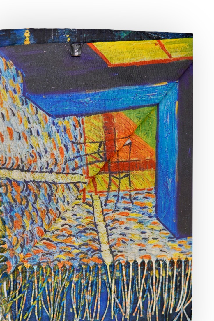 Detaliu de textură moale al unei eșarfe confecționate din amestec de cașmir și viscoză.