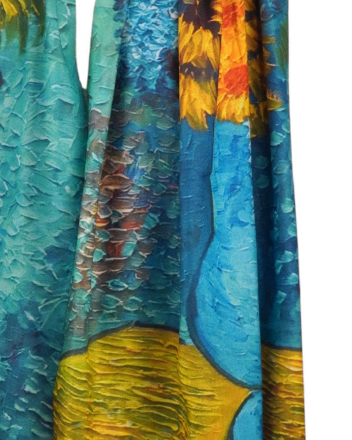 Eșarfă moale din cașmir și viscoză, cu detalii florale și accente portocalii pe fundal albastru.