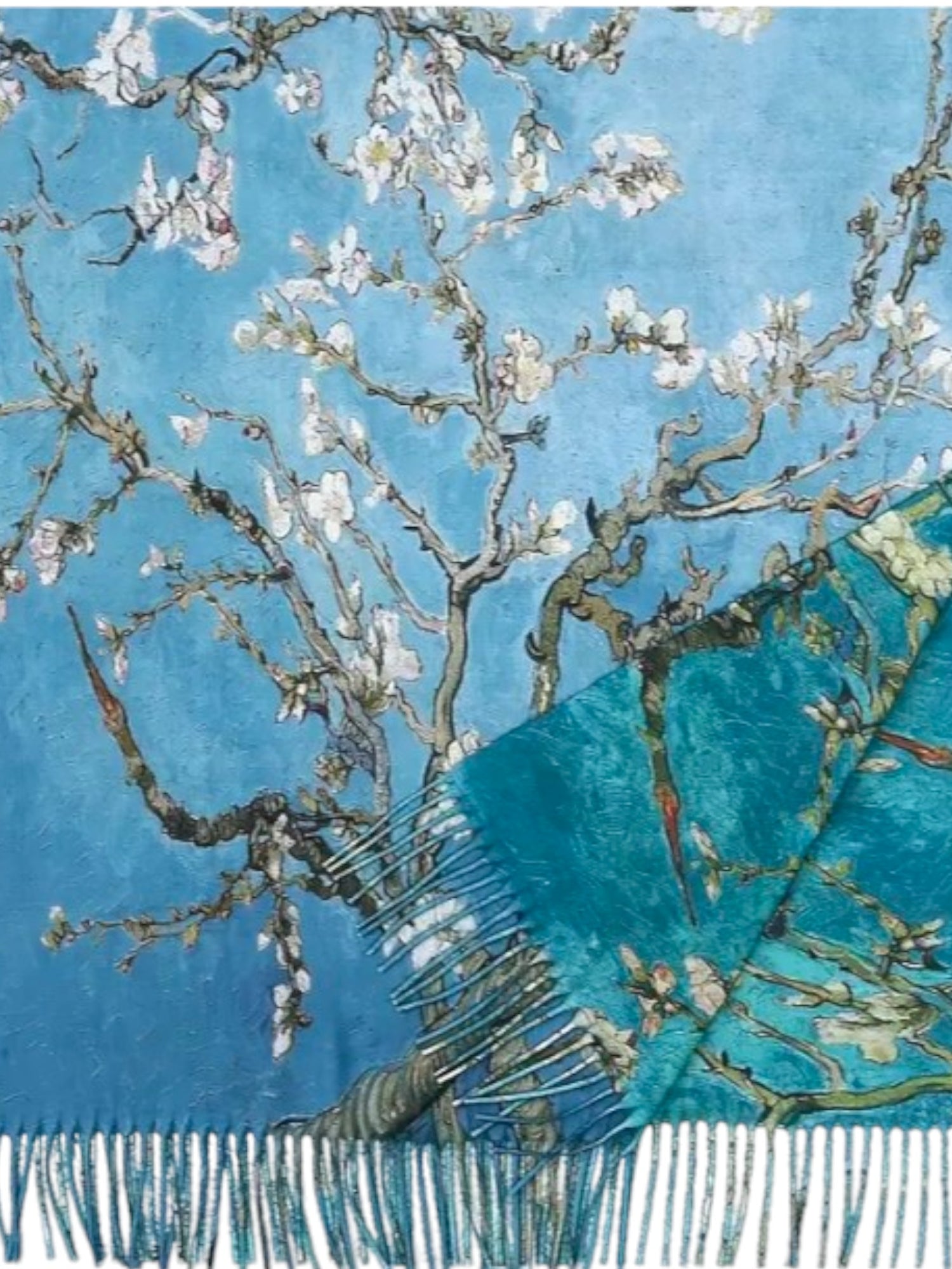 Eșarfă elegantă cu imprimeu dublu, inspirat din grădini și peisaje acvatice, în nuanțe de albastru-verzui.