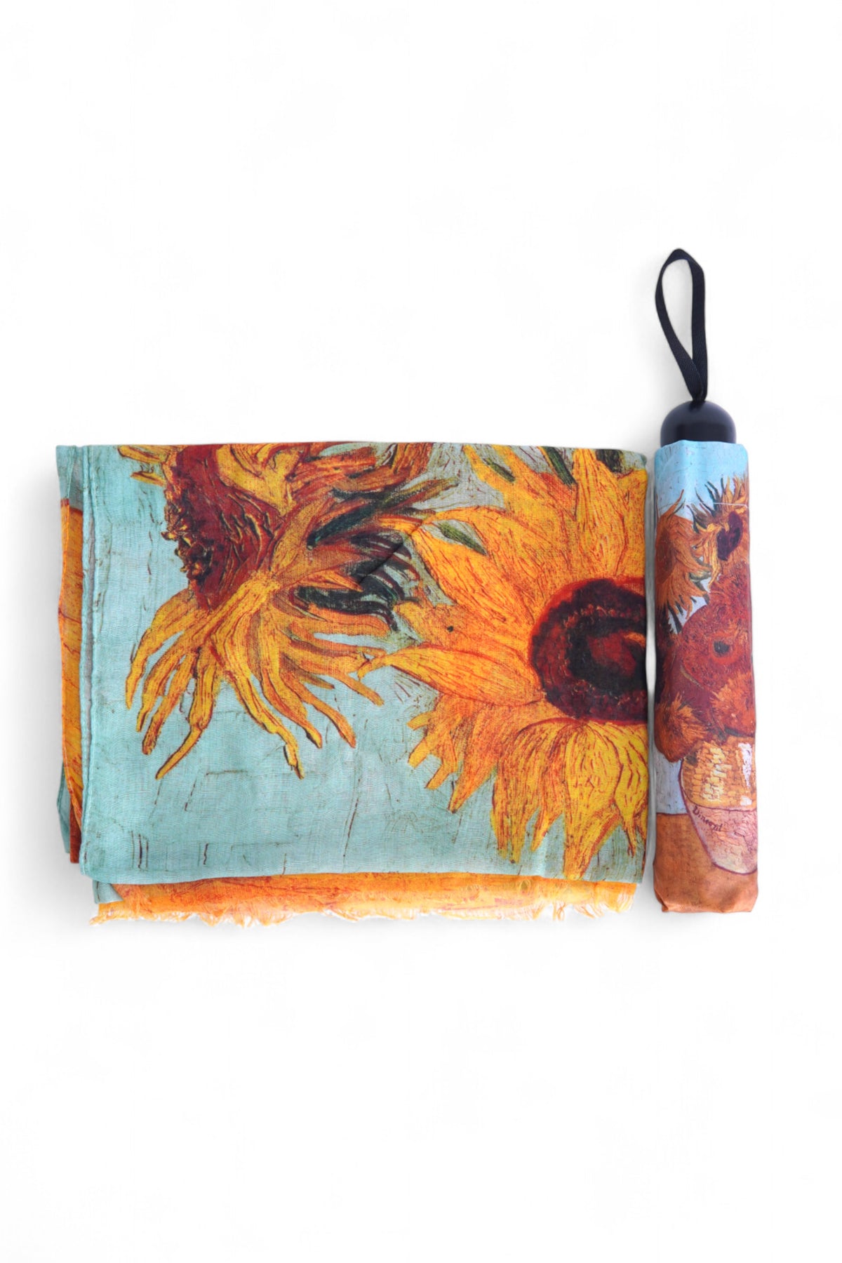 Set format din eșarfă și umbrelă pliată, ambele cu imprimeu colorat inspirat din picturi celebre cu floarea-soarelui.