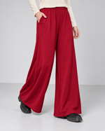 Pantaloni palazzo roșu închis din jerse fluid, cu crac larg, model în mers - All Above Boutique