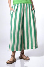 Pantaloni evazați din in gros cu dungi verticale verzi și crem, cu buzunare laterale și betelie elastică.