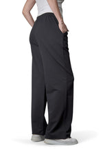 Pantaloni negri lejeri, văzuți din spate, cu croială largă și talie elastică