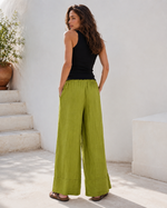 Pantaloni lungi din in cu manșetă și șiret în talie, vedere din spate. All Above Boutique.