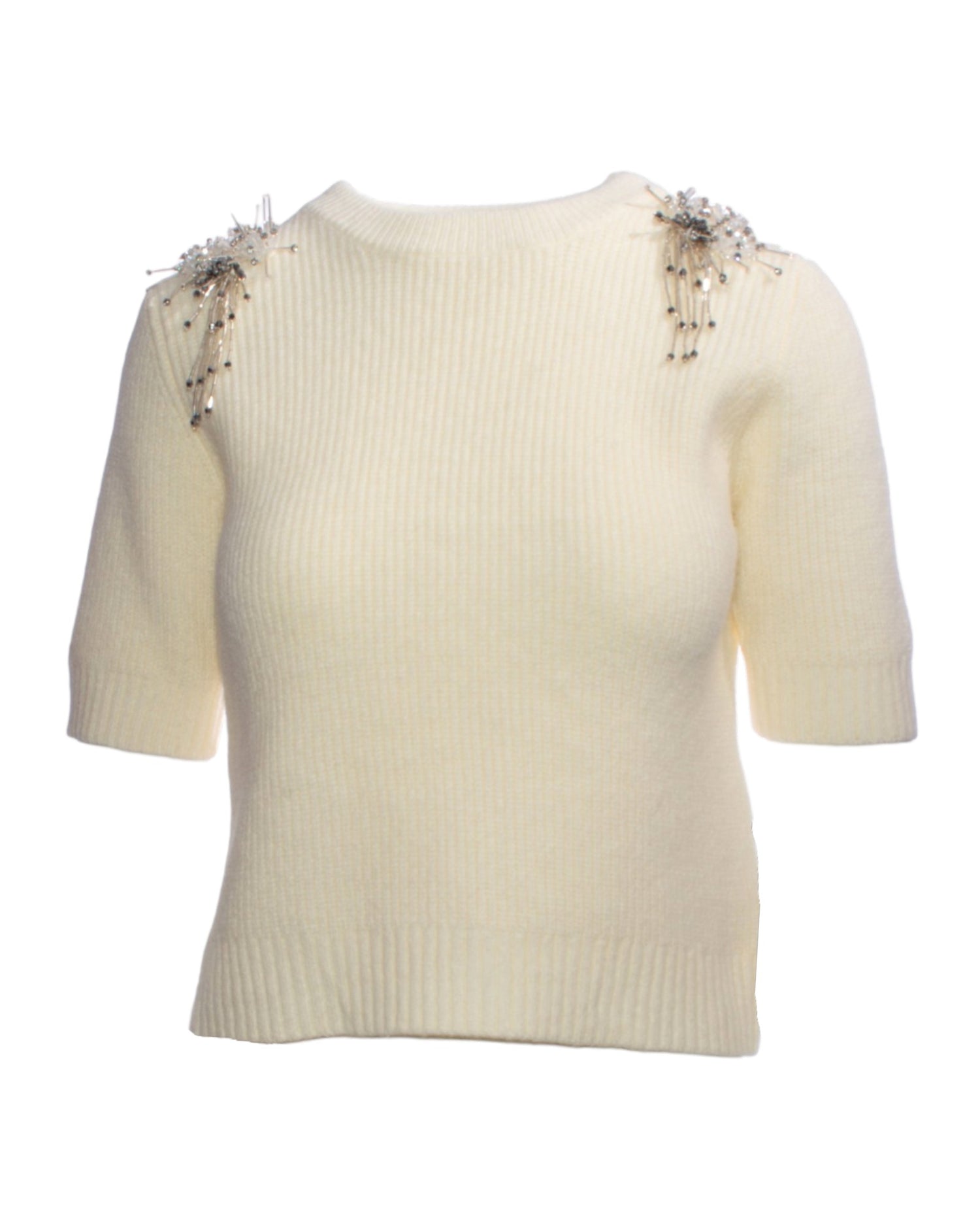 Pulover crem cu mânecă scurtă și aplicații elegante pe umeri, confecționat din material moale și elastic.