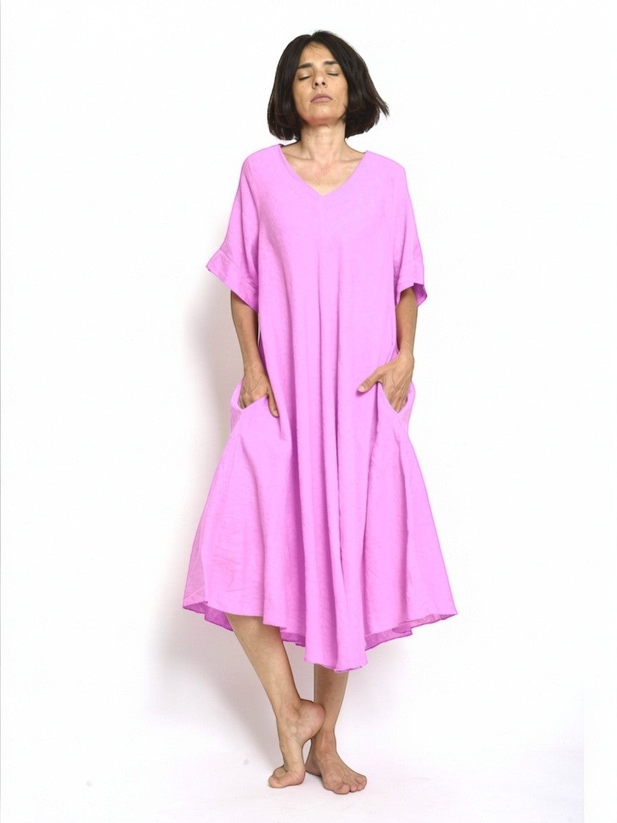 All Above Boutique lilac purple 100% linen V-neck flared midi dress with short sleeves and side pockets.