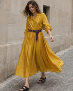 Rochie cămașă galben muștar din tencel satinat cu centură în talie, vedere frontală. All Above Boutique.