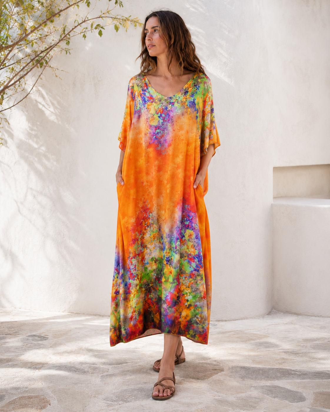 Rochie lungă portocalie mătăsoasă cu decolteu în V, alt unghi cu accent pe cădere fluidă. All Above Boutique.