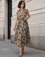 Rochie midi cambrată verde din bumbac cu imprimeu, vedere laterală. All Above Boutique.
