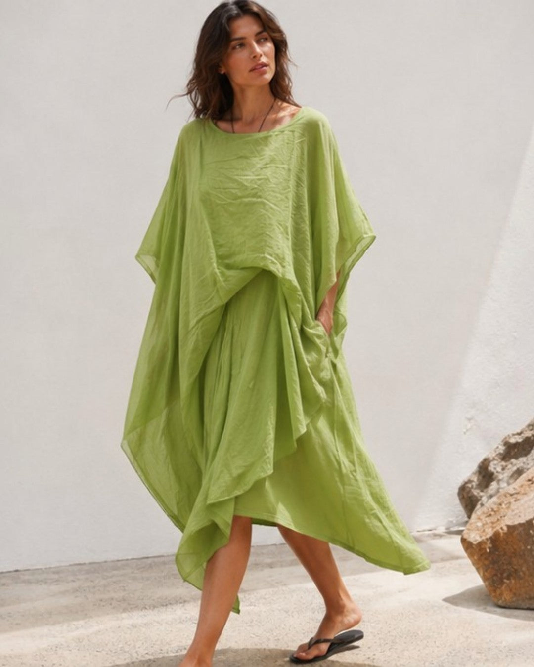 Rochie midi din bumbac verde fistic, cu prinderi laterale și tiv asimetric în colț — All Above Boutique.