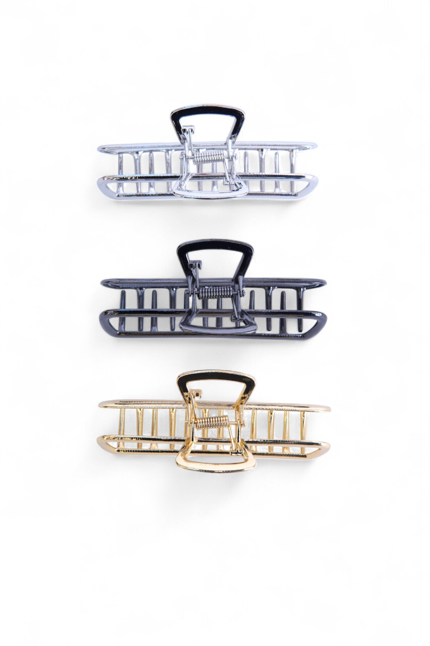 Set de clești de păr în culori metalice mixte, potriviți pentru coafuri rapide și elegante.