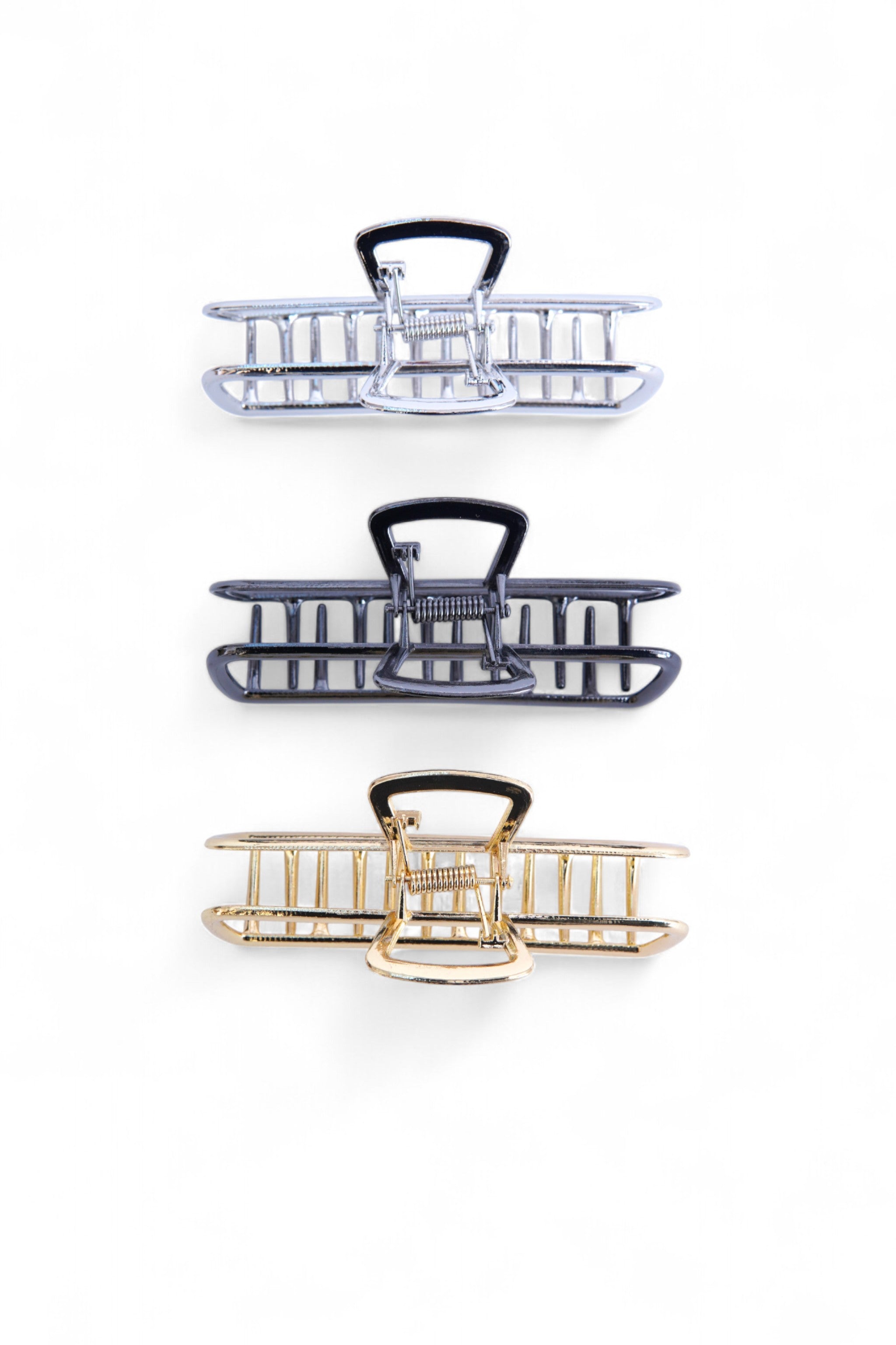 Set de clești de păr în culori metalice mixte, potriviți pentru coafuri rapide și elegante.