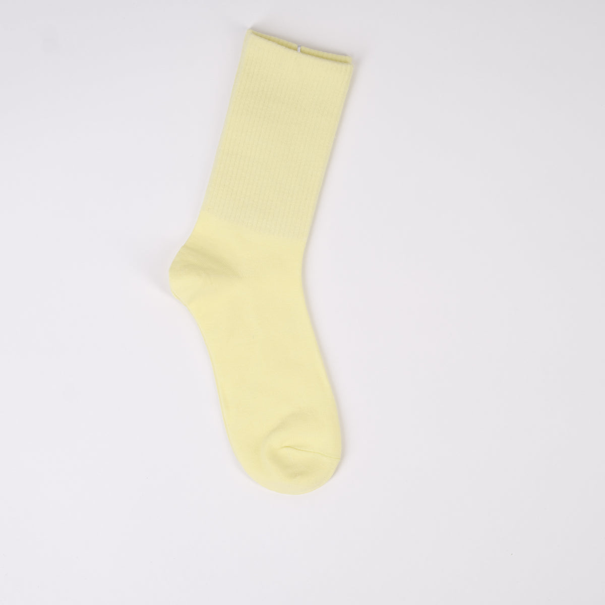 Șosetă galben pal, cu textură fină și elastic pe gambă