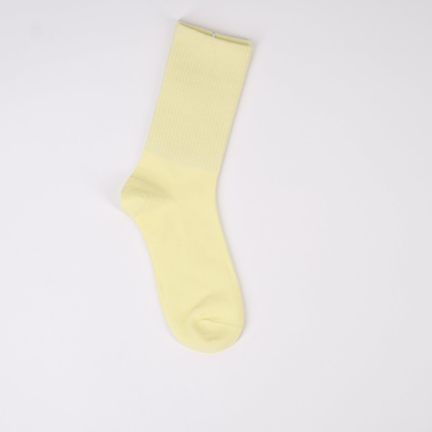 Șosetă galben pal, cu textură fină și elastic pe gambă