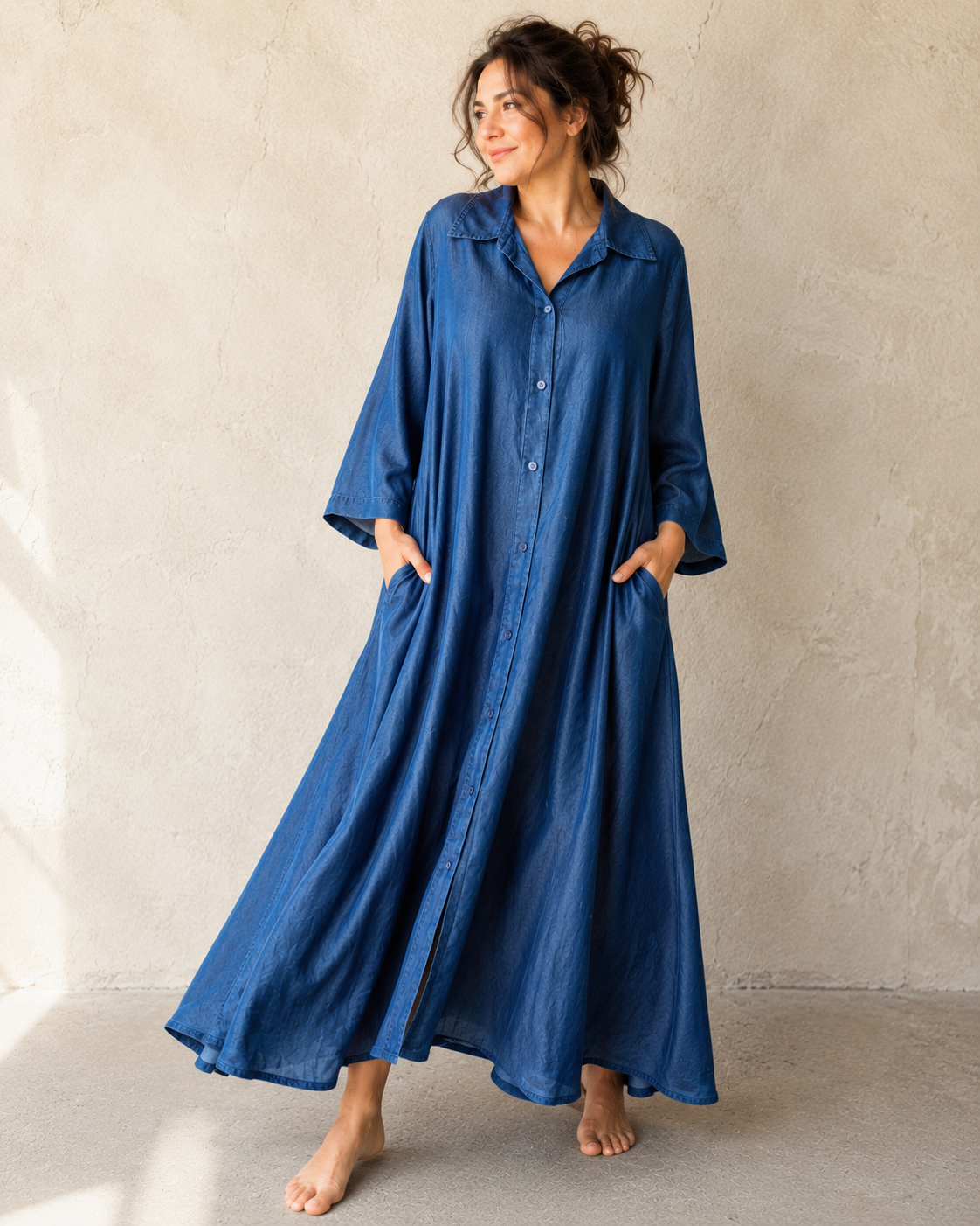 Rochie lungă tip cămașă din denim fluid albastru, cu nasturi și croială oversize, vedere frontală — All Above Boutique.