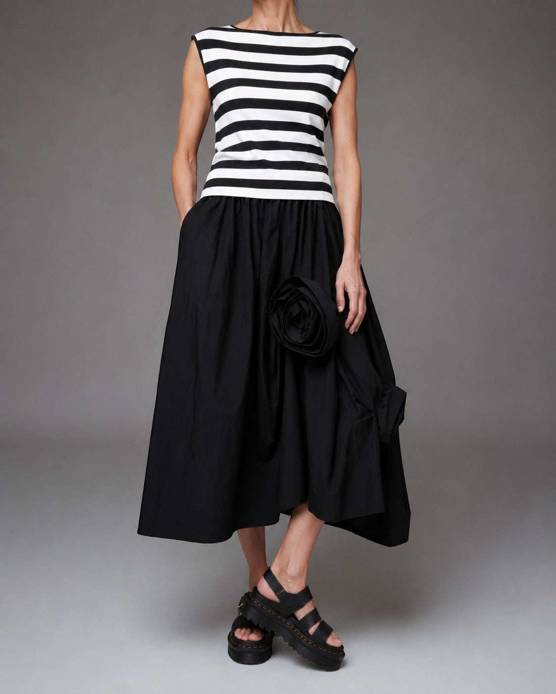 All Above Boutique black cotton asymmetric midi skirt with applied floral detail and elastic waist