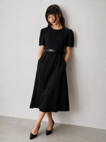 Rochie midi neagră cambrată, cu mâneci bufante și curea îngustă în talie — All Above Boutique.