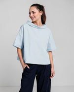 All Above Boutique light blue 100% cotton boat neck relaxed fit short sleeve blouse