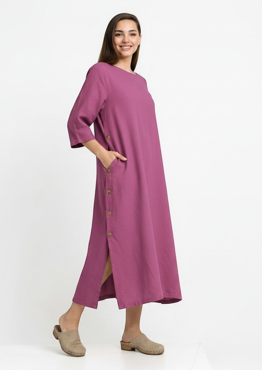 All Above Boutique magenta Tencel midi dress with side buttons, 3/4 sleeves, and pockets.