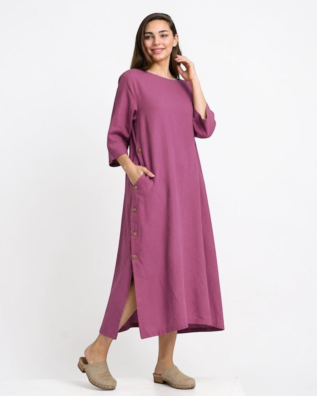 All Above Boutique midi dress in tencel, plum color, with side buttons, pockets and 3/4 sleeves.