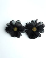 All Above Boutique black fabric flower earrings with gold center detail, delicate and romantic design.