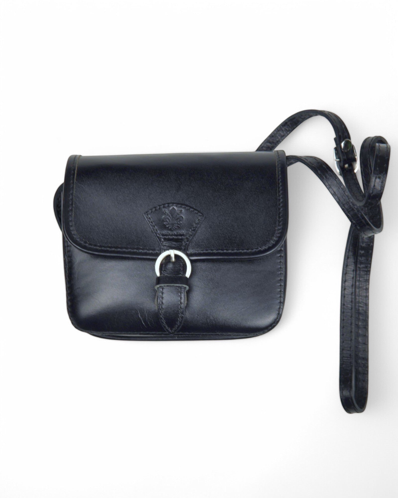 All Above Boutique black leather crossbody satchel with buckle closure and adjustable strap.