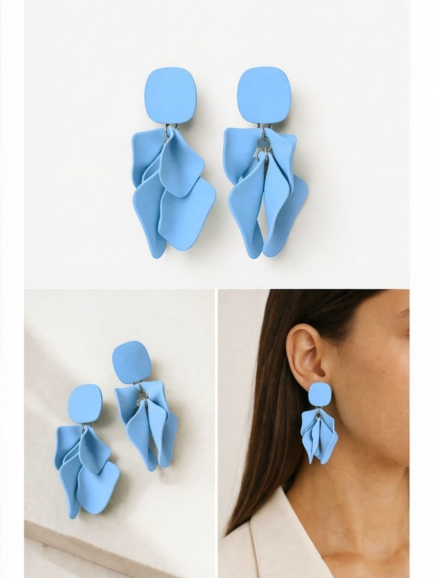 All Above Boutique light blue matte metal petal drop earrings with square top.