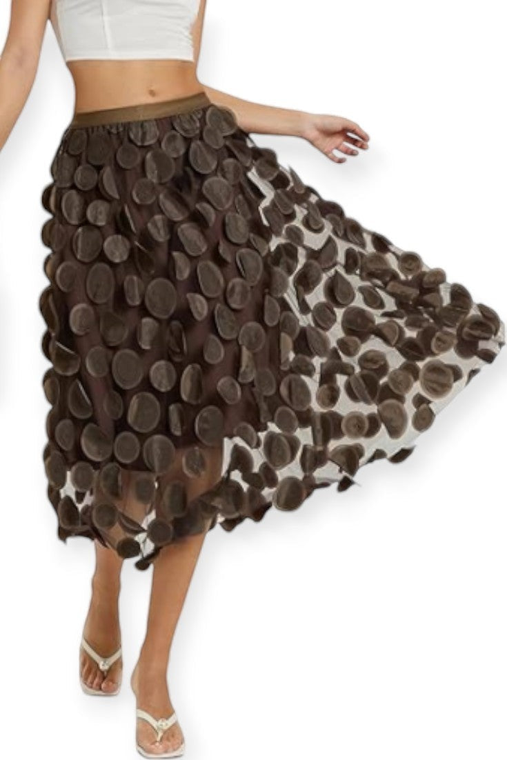 All Above Boutique brown midi tulle skirt with applied petal details and elastic waist. Elegant, flowing design.