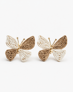 All Above Boutique butterfly earrings made of woven straw in beige and white, perfect for a boho summer look.